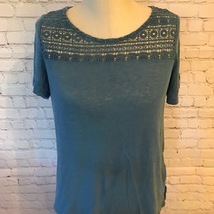 Blouse with knitted design